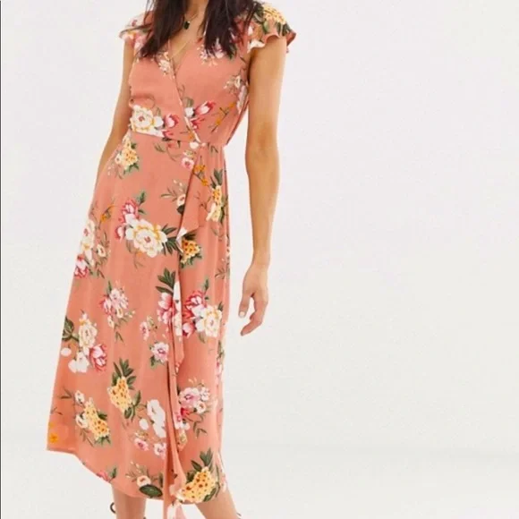 band of gypsies pink floral dress Band of Gypsies medium pink ruffle dress floral print ties around neck pockets